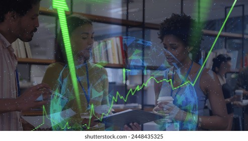 Image of data processing and globe over diverse business people working in office. Global business, finances, computing and data processing concept digitally generated image.