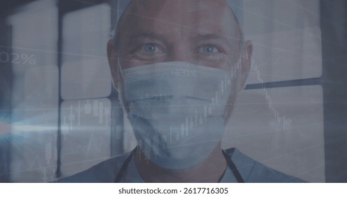 Image of data processing and globe over caucasian male surgeon wearing face mask. Global covid 19 pandemic, medicine and healthcare concept digitally generated image.