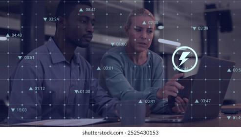 Image of data processing and media icons over diverse colleagues discussing work. Global business and digital interface concept digitally generated image.