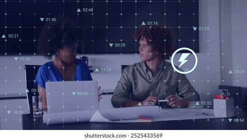 Image of data processing and media icons over diverse colleagues discussing work. Global business and digital interface concept digitally generated image.