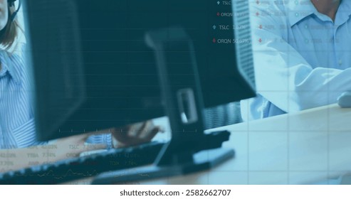 Image of data processing on charts over caucasian colleagues in headsets using computers. Business, digital interface, connection, network and communication, digitally generated image.