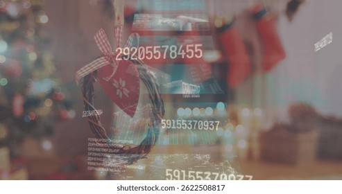 Image of data processing on screens over christmas decoration. christmas, celebration, data processing and technology concept digitally generated image. - Powered by Shutterstock - Get 15% off with code: PIKWIZARD15