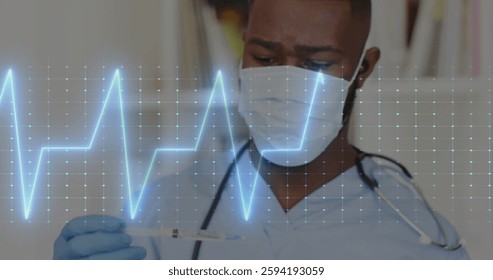 Image of data processing over afrcian american male doctor in face mask. Global medicine, connections, computing and data processing concept digitally generated image.
