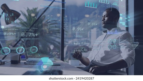 Image of data processing over african american businessman in office. Global networks, business, finances, computing and data processing concept digitally generated image.