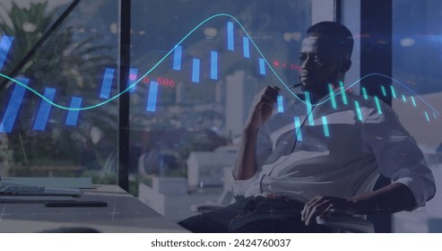 Image of data processing over african american businessman. Global business and digital interface concept digitally generated image.