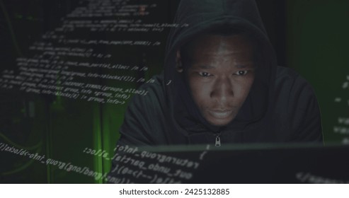 Image of data processing over african american male hacker in server room. global technology and digital interface concept digitally generated image.