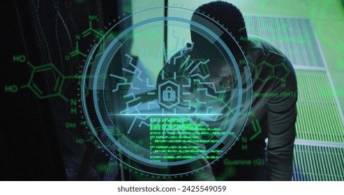 Image of data processing over african american male worker in server room. Global business and digital interface concept digitally generated image.