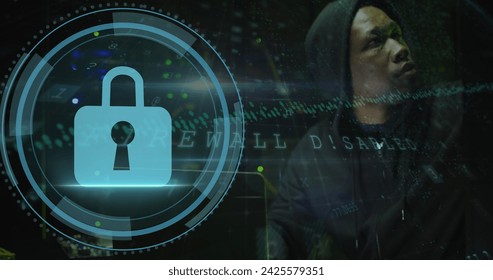 Image of data processing over african american male hacker in server room. Global business and digital interface concept digitally generated image.