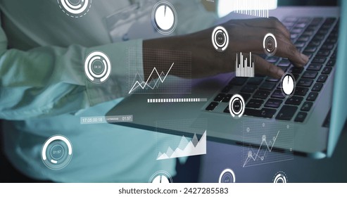 Image of data processing over african american male it engineer with laptop. Global computing and data processing concept digitally generated image.