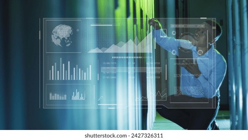 Image of data processing over african american male it engineer and computer servers. Global computing and data processing concept digitally generated image.