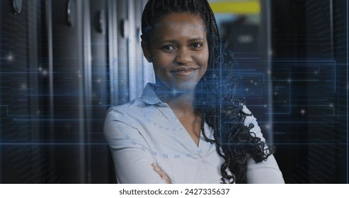 Image of data processing over african american female it engineer and computer servers. Global computing and data processing concept digitally generated image