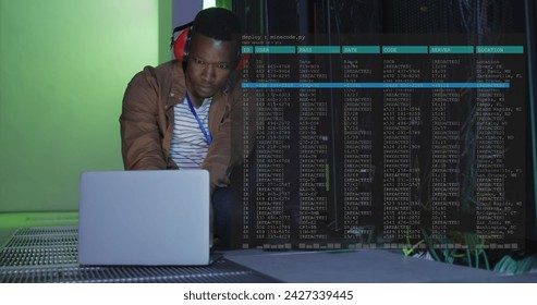 Image of data processing over african american male it engineer and computer servers. Global computing and data processing concept digitally generated image. - Powered by Shutterstock - Get 15% off with code: PIKWIZARD15