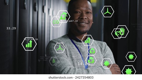 Image of data processing over african american male it engineer and computer servers. Global computing and data processing concept digitally generated image.