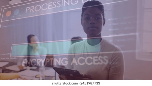 Image of data processing over african american businesswoman using tablet. Global business and digital interface concept digitally generated image.
