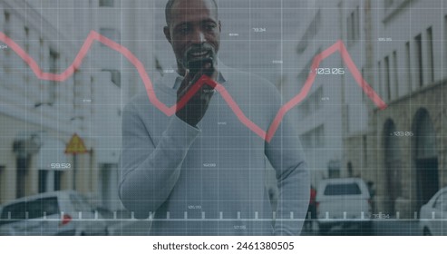 Image of data processing over african american man using smartphone. Global business, computing, digital interface and data processing concept digitally generated image.