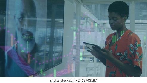 Image of data processing over african american business people working in office. Global business and digital interface concept digitally generated image.