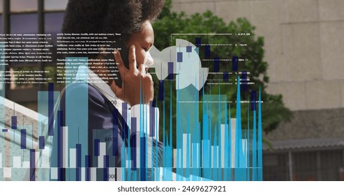 Image of data processing over african american businesswoman walking. Global business and digital interface concept digitally generated image.