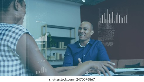 Image of data processing over african american male and female discussing at office. Computer interface and business technology concept