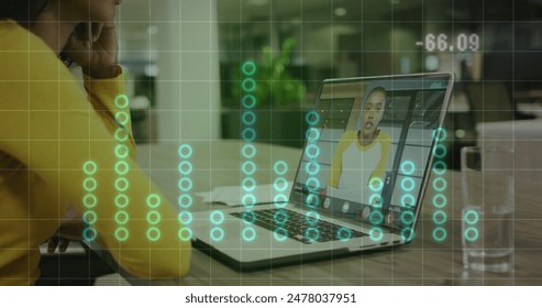 Image of data processing over african american woman on laptop image call. Global business, finance, data processing and digital interface concept digitally generated image.