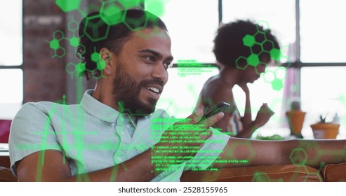 Image of data processing over african american man using smartphone. Global technology, social media and digital interface concept digitally generated image.