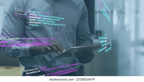 Image of data processing over african american businessman using tablet. Business, communication, technology, computing and digital interface concept digitally generated image.