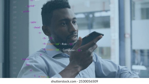 Image of data processing over african american businessman talking on smartphone. Business, communication, technology, computing and digital interface concept digitally generated image.