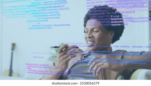 Image of data processing over african american businessman talking on smartphone. Business, communication, technology, computing and digital interface concept digitally generated image.