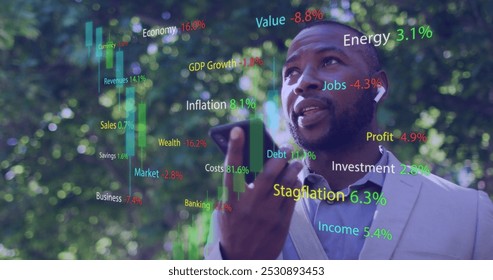 Image of data processing over african american businessman talking on smartphone. Global business, computing and digital interface concept digitally generated image.