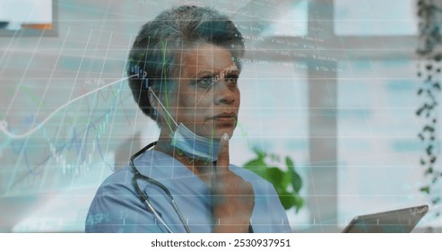 Image of data processing over african american female doctor with tablet. senior home hangout and digital interface concept digitally generated image. - Powered by Shutterstock