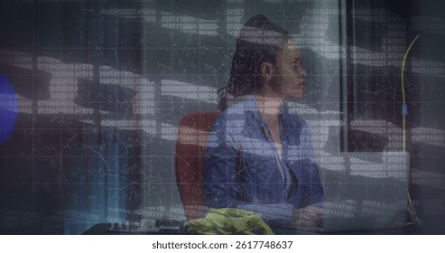 Image of data processing over african american female worker in server room. global technology and digital interface concept digitally generated image.