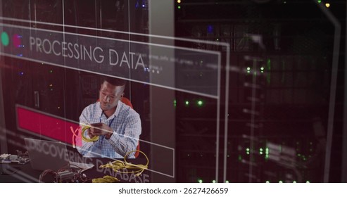 Image of data processing over african american working on laptop in server room. network, programming, computers and technology concept digitally generated image.