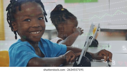 Image of data processing over african american schoolchildren using tablets in classroom. Global education, computing and digital interface concept digitally generated image.