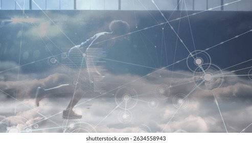 Image of data processing over african american man running. Global business and digital interface concept digitally generated image.