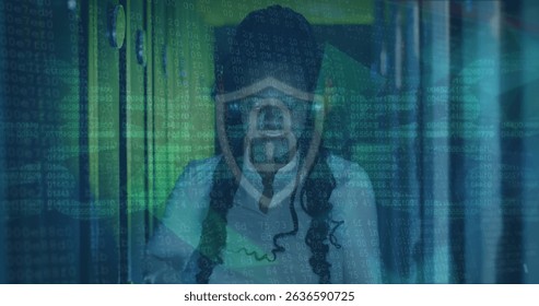 Image of data processing over african american female server room worker using headphones. Cloud computing concept digitally generated image.