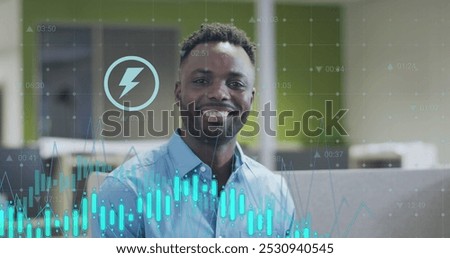 Image of data processing over african american businessman working in office. Global business and digital interface concept digitally generated image.