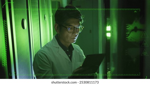Image of data processing over asian male worker in server room. Global business and digital interface concept digitally generated image.