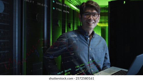 Image of data processing over asian male it engineer by computer servers. Global finance, business, connections, computing and data processing concept digitally generated image.