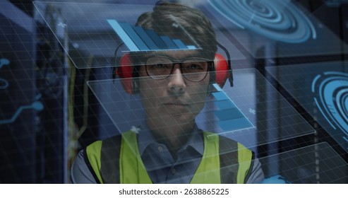 Image of data processing over asian male worker in server room. Global business and digital interface concept digitally generated image.