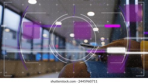Image of data processing over biracial woman using smartphone. digital interface and data processing concept digitally generated image.