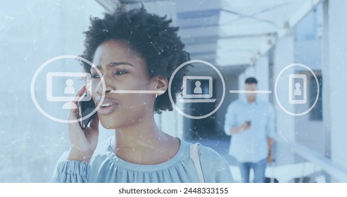 Image of data processing over biracial businesswoman using smartphone in airport. Global business, finances, computing and data processing concept digitally generated image.
