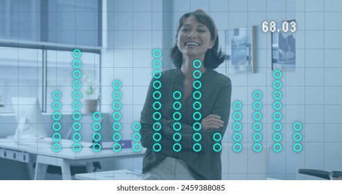 Image of data processing over biracial businesswoman at office. Global business, finances and digital interface concept, digitally generated image.