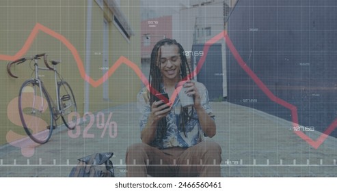 Image of data processing over biracial man using smartphone. Global business, computing, digital interface and data processing concept digitally generated image.