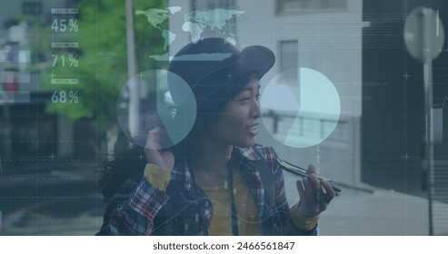 Image of data processing over biracial woman using smartphone. Global business, computing, digital interface and data processing concept digitally generated image.