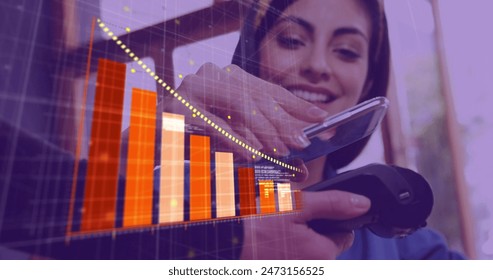 Image of data processing over biracial woman paying with smartphone. global business and digital interface concept digitally generated image.