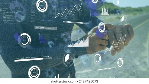 Image of data processing over biracial sportsman. Global technology and digital interface concept digitally generated image.