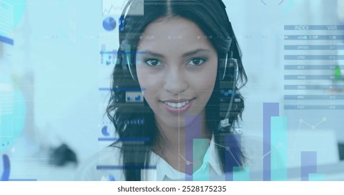 Image of data processing over biracial businesswoman using phone headset. Global business and digital interface concept digitally generated image.