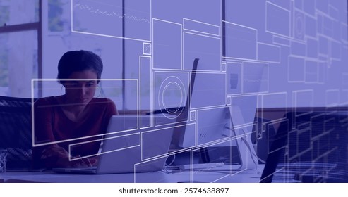 Image of data processing over biracial businesswoman using laptop. Global finance, business, connections, computing and data processing concept digitally generated image.