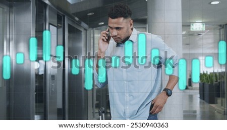 Image of data processing over biracial businessman in office. Global business and digital interface concept digitally generated image.