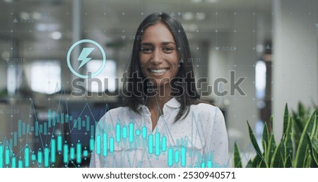 Image of data processing over biracial businesswoman smiling in office. Global business and digital interface concept digitally generated image.