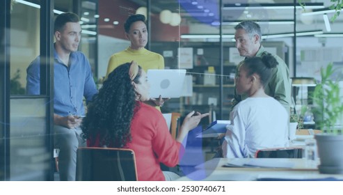 Image of data processing over business people working in office. Global computing, finance, business and data processing concept digitally generated image.